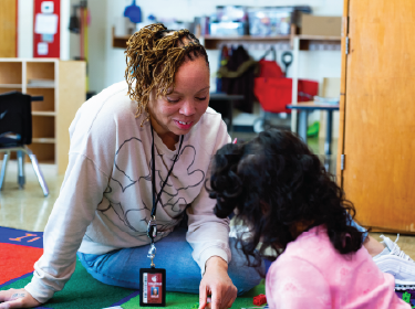 teacher tutoring student